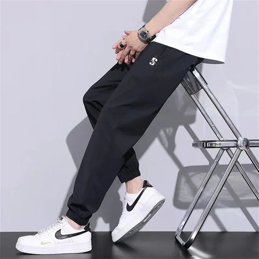 New Ice Silk Pants Men's Fashion Brand Loose Leg Tie Sports Quick Drie 2023 Summer Thin Breathable Cropped Casual Pants