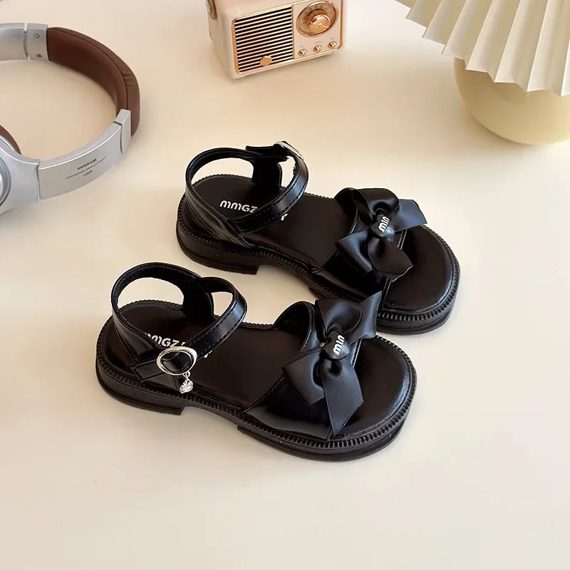 2025 New Children's Sandals Summer Bow Princess Casual Shoes Children's Soft Bottom Beach Flat Shoes Fashionable and Versatile