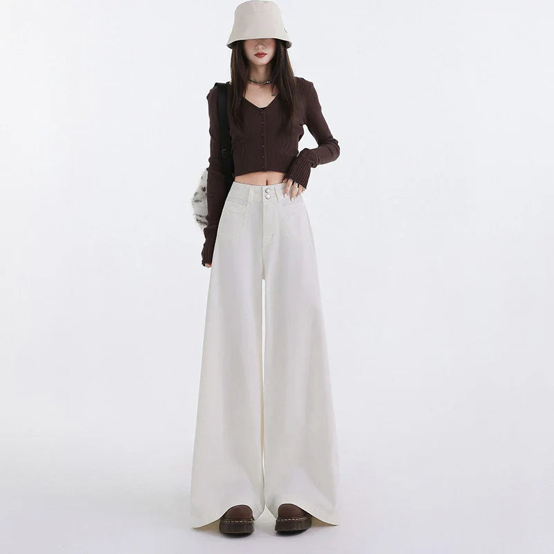 Calça Jeans Feminina de Cintura Alta com Perna Larga, Caimento Solto e Perna Reta tipo Trombeta, Comprimento até o Chão