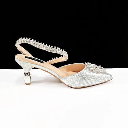 Party Perfection: Rhinestone-Embellished Heels and Gold Mini Bag for Elegant Nights