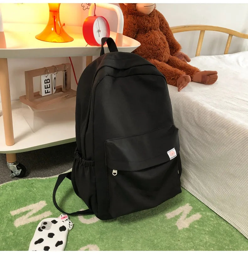 Sweet soft girl solid color large capacity student backpack new style for men and women college students simple trendy