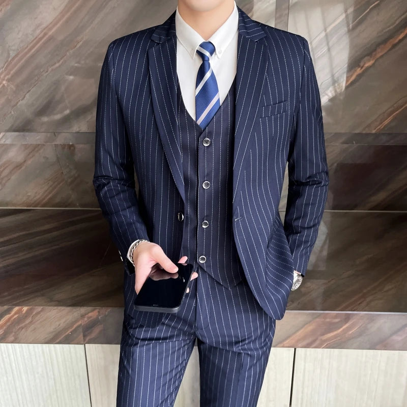 New three-piece suit with tailored striped business suit blazer and trousers set. Korean fashion trend. Stylish wedding attire.