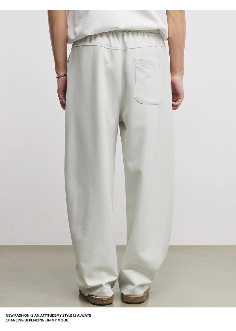 Calças de Moletom Masculinas American Casual Fashion Primavera e Outono 2026 Novas Calças Esportivas Soltas de Camada de Ar Scimitar