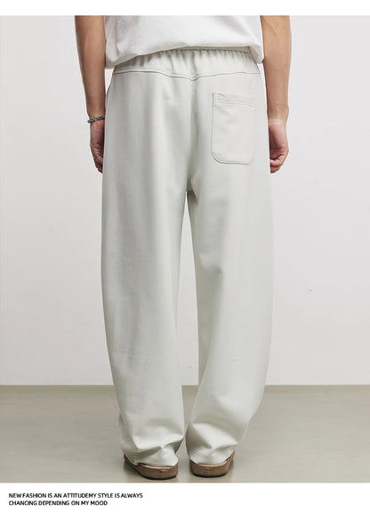 Calças de Moletom Masculinas American Casual Fashion Primavera e Outono 2026 Novas Calças Esportivas Soltas de Camada de Ar Scimitar