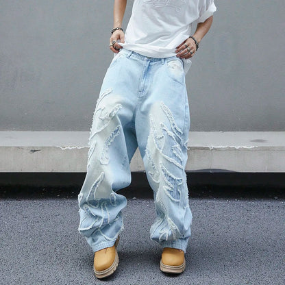 Men's trendy and cool denim wide-leg pants for all seasons featuring unique patchwork patterns, light blue street-stunning style