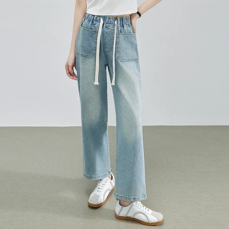 Calça Jeans Feminina Azul Descolorida Perna Larga com Cós Alto Elástico e Cordão