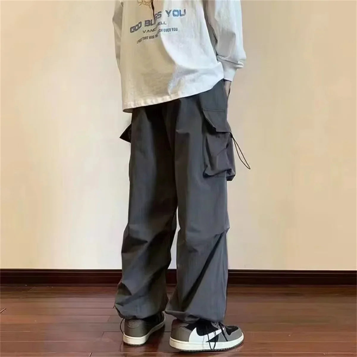 Streetwear 2025 New Spring Harem Multicolored Casual Pants Men Elastic Waist Solid Color Cargo Pants Multi Pocket Baggy Pants