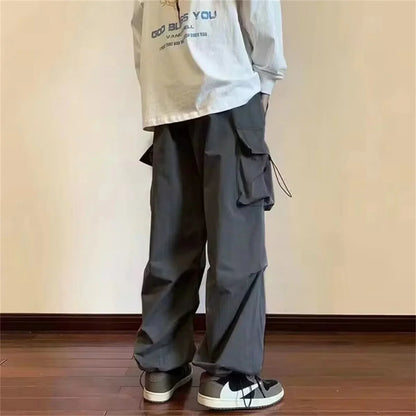 Streetwear 2025 New Spring Harem Multicolored Casual Pants Men Elastic Waist Solid Color Cargo Pants Multi Pocket Baggy Pants