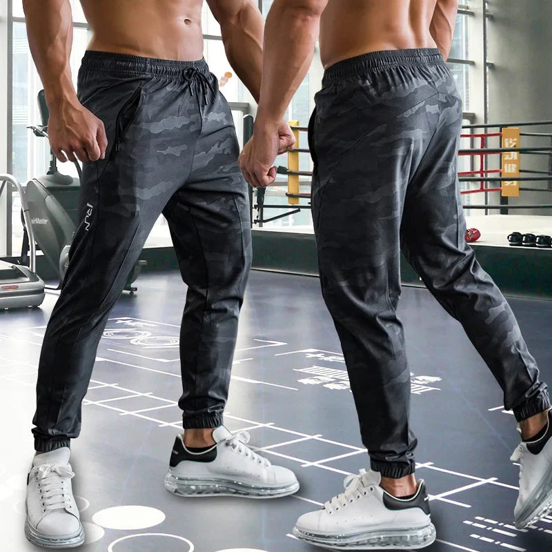 Mens Gym Fitness Running Sweatpants Workout Athletic Long Pants Outdoor Training Sports Trousers Elastic Waist Zipper Pockets