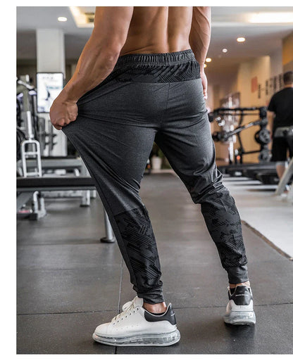 Mens Gym Fitness Running Sweatpants Workout Athletic Long Pants Outdoor Training Sports Trousers Elastic Waist Zipper Pockets