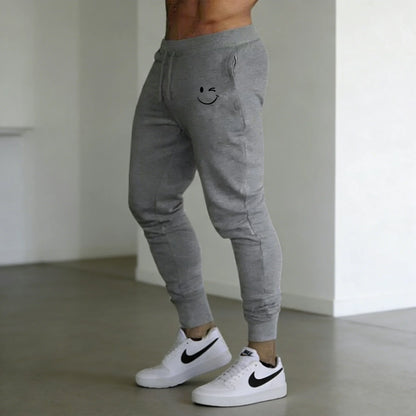 New Men‘s Smiling face print Sports Pants Running Trousers Workout Jogging Long Pants Gym Sport Joggers for Men Gyms Fitness