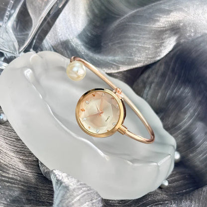 Women's Slim little bracelet 1 large pearl diamond cut glass rhinestone dial Minimalist quartz watch Bracelet Watch