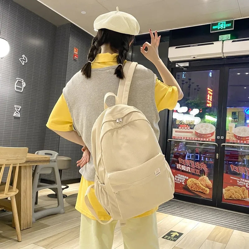 Sweet soft girl solid color large capacity student backpack new style for men and women college students simple trendy