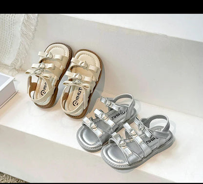 Girls Sandals New 2024 Summer Kids Fashion Bowknot Heart Princess Sandals Party Dress Shoes Children Soft Sole Beach Flats Shoe