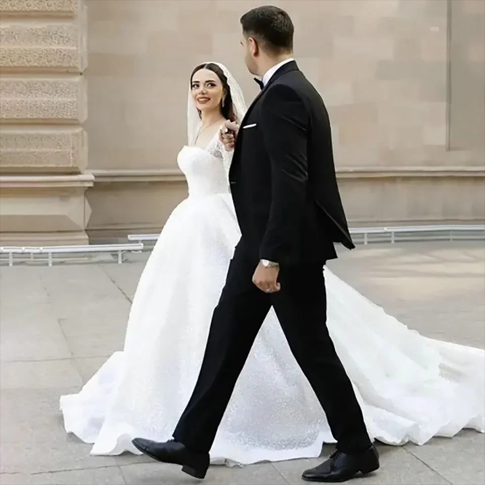 Customized Gorgeous Beaded Sequin Boat Neck Ball Gown Wedding Dresses 2025 Long Sleeves Court Train Tulle Bridal Gowns