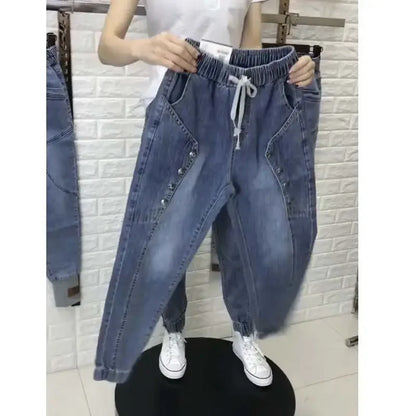 Calça Jeans Feminina Elástico na Cintura com Amarração no Tornozelo