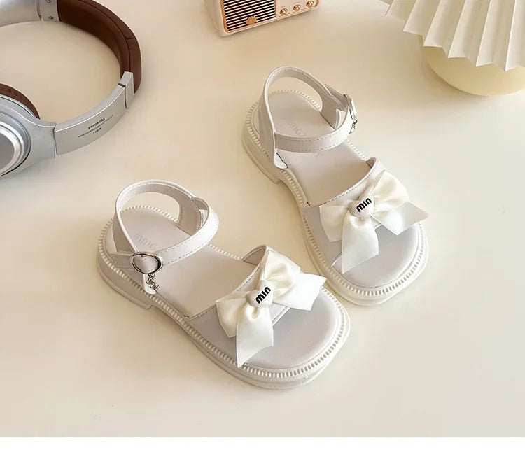 2025 New Children's Sandals Summer Bow Princess Casual Shoes Children's Soft Bottom Beach Flat Shoes Fashionable and Versatile