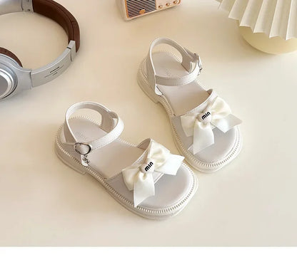 2025 New Children's Sandals Summer Bow Princess Casual Shoes Children's Soft Bottom Beach Flat Shoes Fashionable and Versatile