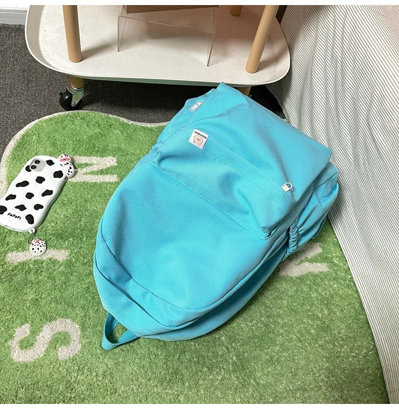 Sweet soft girl solid color large capacity student backpack new style for men and women college students simple trendy
