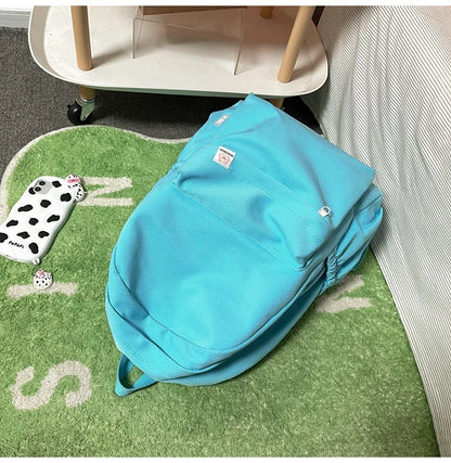 Sweet soft girl solid color large capacity student backpack new style for men and women college students simple trendy