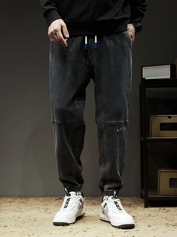Calça Jeans Masculina Cargo Primavera Verão Levemente Elástica Algodão Denim Jogger Preta Azul Streetwear Folgada
