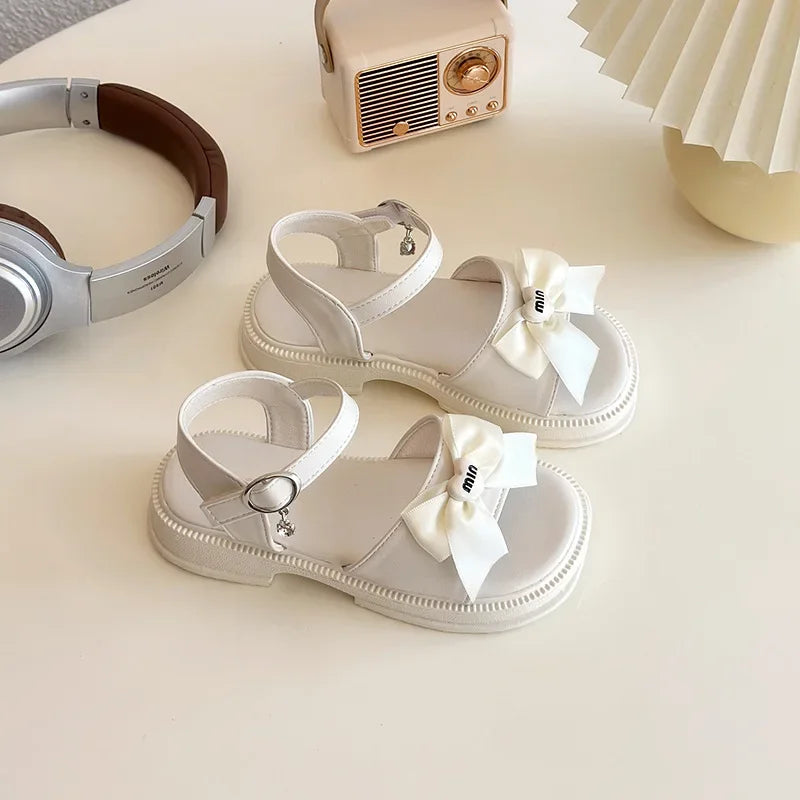 2025 New Children's Sandals Summer Bow Princess Casual Shoes Children's Soft Bottom Beach Flat Shoes Fashionable and Versatile