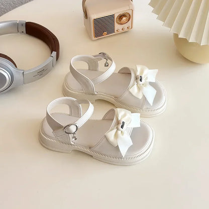2025 New Children's Sandals Summer Bow Princess Casual Shoes Children's Soft Bottom Beach Flat Shoes Fashionable and Versatile