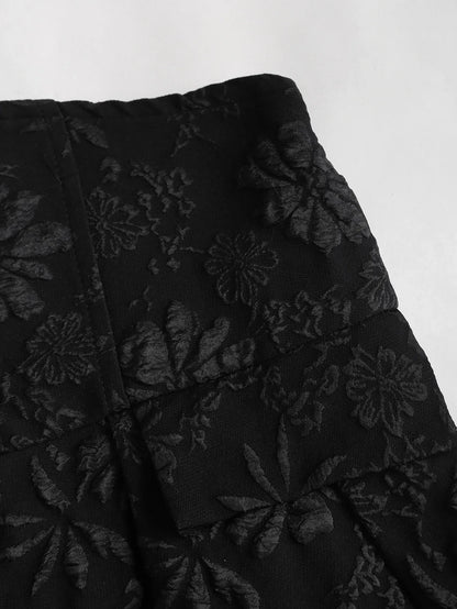 Black floral jacquard strapless dress with button embellishments and puff style skirt