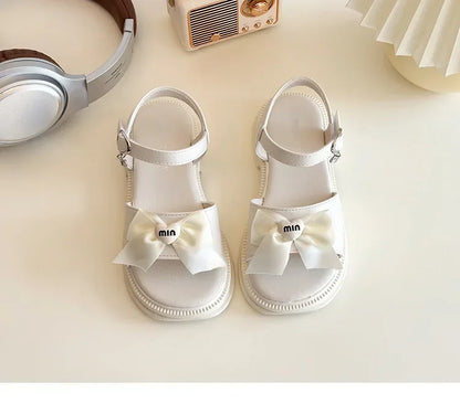 2025 New Children's Sandals Summer Bow Princess Casual Shoes Children's Soft Bottom Beach Flat Shoes Fashionable and Versatile