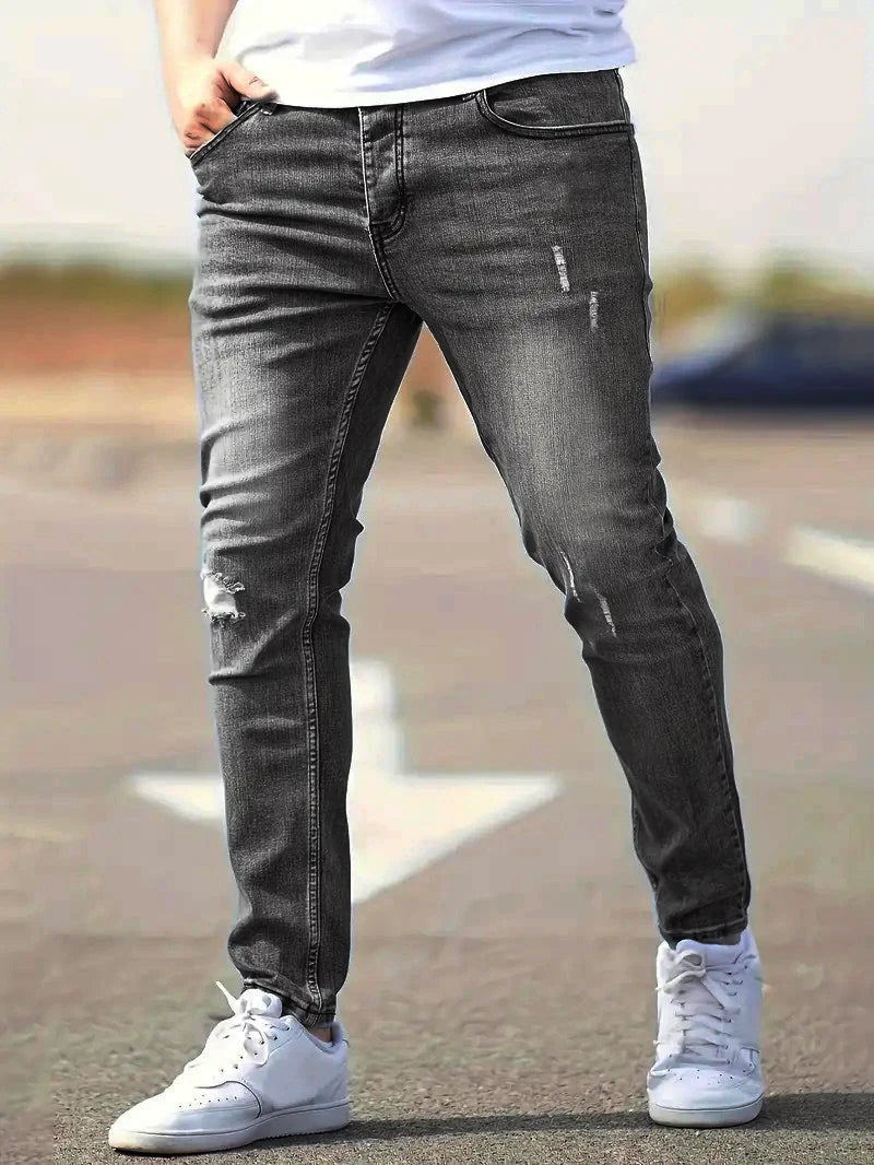 Calça Jeans Masculina Skinny Destroyed Primavera 2026 Lavagem Vintage Elástica Biker com Buracos Casual Ajuste Justo Streetwear Jeans Lápis Jogger