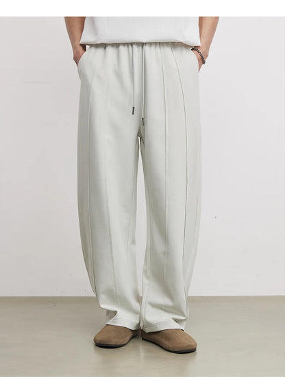 Calças de Moletom Masculinas American Casual Fashion Primavera e Outono 2026 Novas Calças Esportivas Soltas de Camada de Ar Scimitar