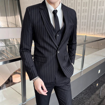 New three-piece suit with tailored striped business suit blazer and trousers set. Korean fashion trend. Stylish wedding attire.