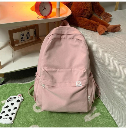 Sweet soft girl solid color large capacity student backpack new style for men and women college students simple trendy
