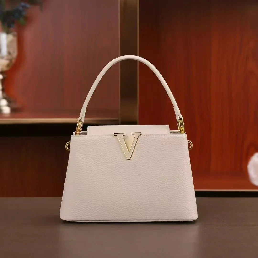New 2025 simple V-shaped decorative handheld fashionable messenger bag trendy bucket women's small bag