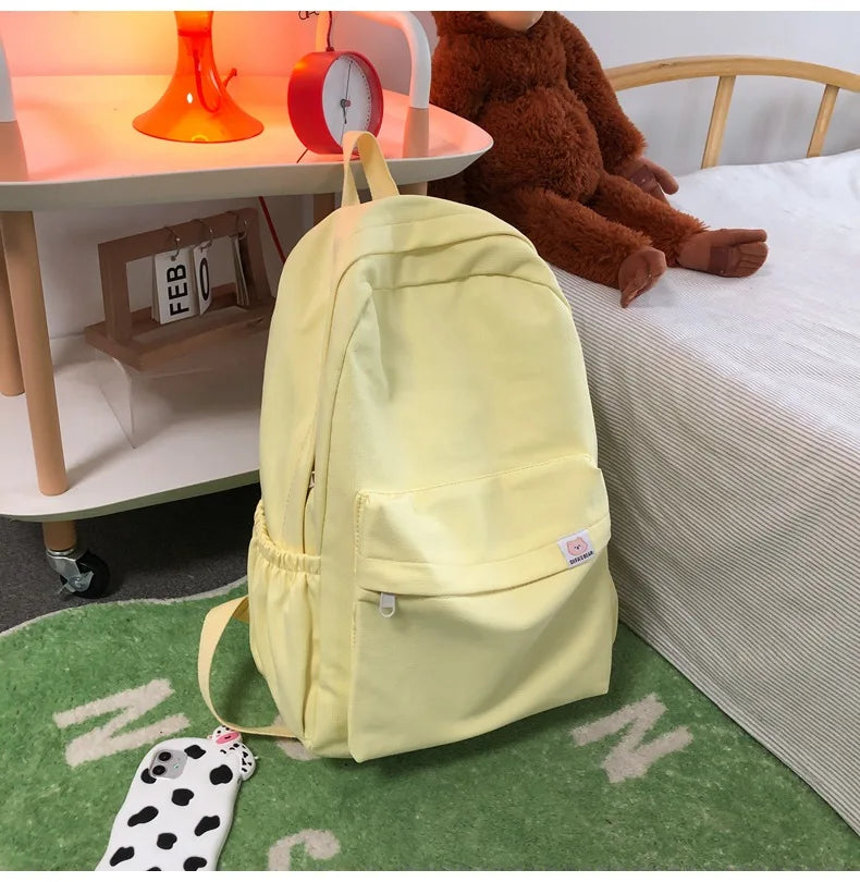 Sweet soft girl solid color large capacity student backpack new style for men and women college students simple trendy