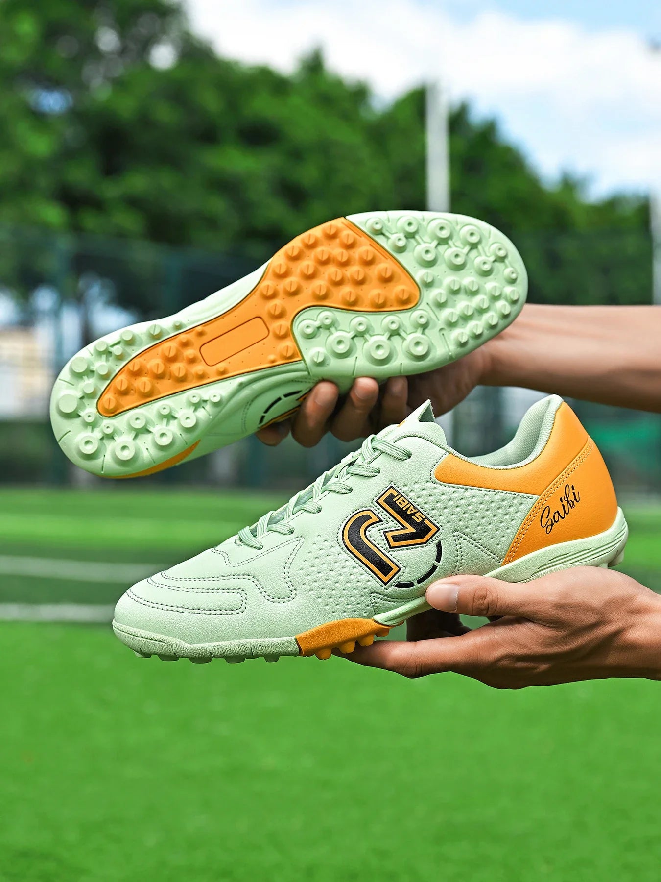 Fashionable sports style professional men's football shoes TF broken nail outdoor sports shoes effectively protect ankles