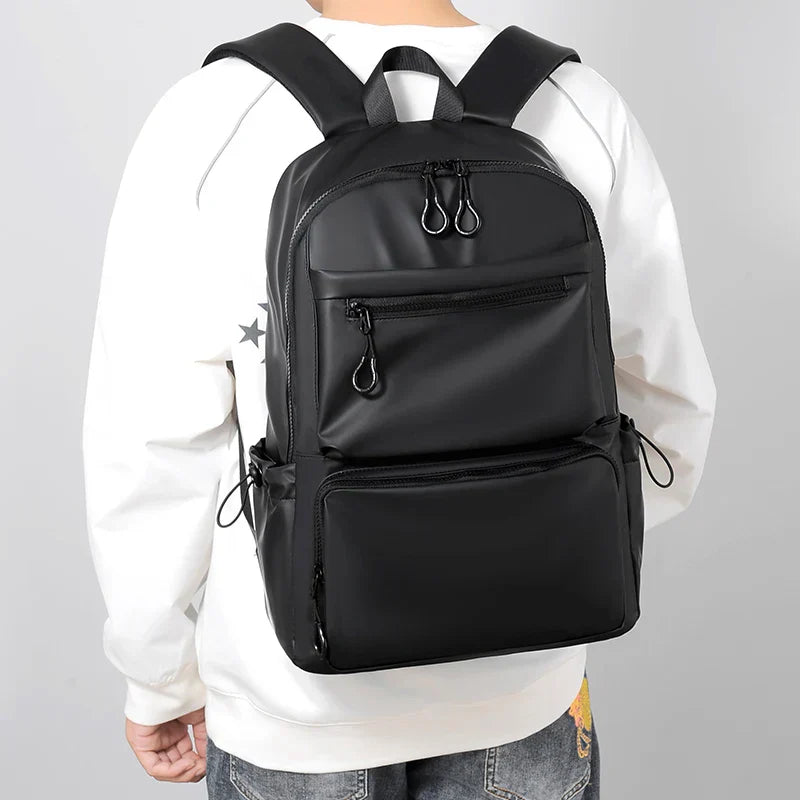 1Pcs 14-inch Fashion Casual Backpack, Spacious Laptop Compartment,Waterproof Fabric,Ideal for Men, Students, and Professionals