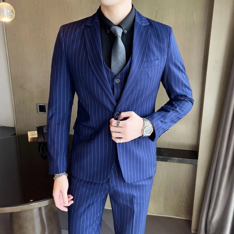 New three-piece suit with tailored striped business suit blazer and trousers set. Korean fashion trend. Stylish wedding attire.