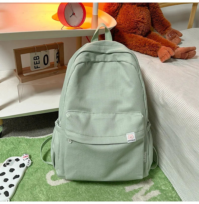 Sweet soft girl solid color large capacity student backpack new style for men and women college students simple trendy