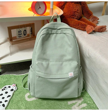 Sweet soft girl solid color large capacity student backpack new style for men and women college students simple trendy