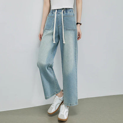 Calça Jeans Feminina Azul Descolorida Perna Larga com Cós Alto Elástico e Cordão