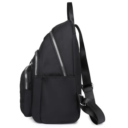 Men's and women's fashionable backpack made of nylon, suitable for travel, tourism and photography. It has multiple pockets.