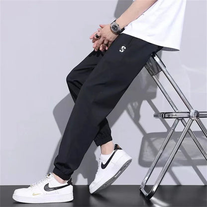 New Ice Silk Pants Men's Fashion Brand Loose Leg Tie Sports Quick Drie 2023 Summer Thin Breathable Cropped Casual Pants