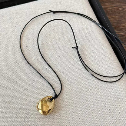Vintage Irregular Punk Metal Bean Pendant Necklace for Women Adjustable Black Leather Rope Long Clavicle Chain Charm Jewerly