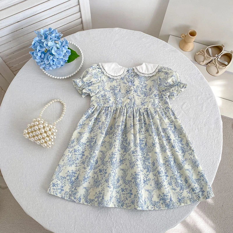 2026 Novo Vestido de Verão para Meninas Crianças 2-6 Anos Vestido de Manga Curta Bufante Estampa Floral Gola Franzida Algodão Doce