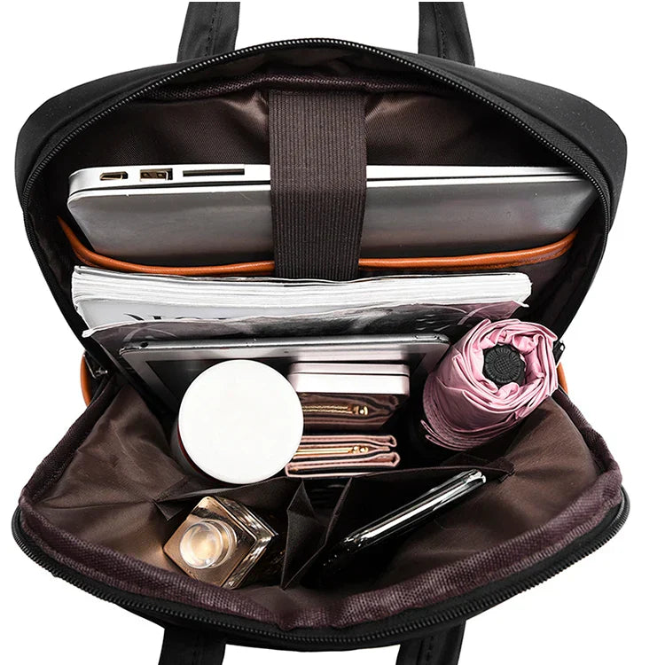Laptop backpack with multiple pockets, adjustable shoulder straps, zipper closure, multi-purpose, school backpack