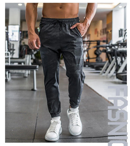 Mens Gym Fitness Running Sweatpants Workout Athletic Long Pants Outdoor Training Sports Trousers Elastic Waist Zipper Pockets