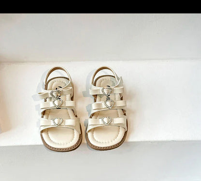 Girls Sandals New 2024 Summer Kids Fashion Bowknot Heart Princess Sandals Party Dress Shoes Children Soft Sole Beach Flats Shoe