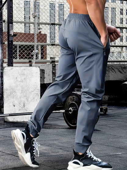 Men's waist drawstring quick drying high elasticity solid color sports training outdoor pants with zipper pocket