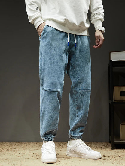 Calça Jeans Masculina Cargo Primavera Verão Levemente Elástica Algodão Denim Jogger Preta Azul Streetwear Folgada